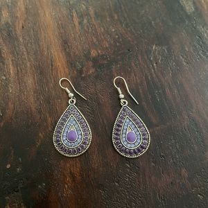 silver and purple dangly earrings